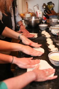 the volunteers learn to make Mufleta